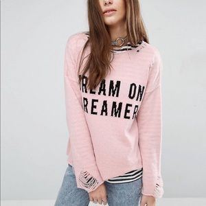 New distressed sweater